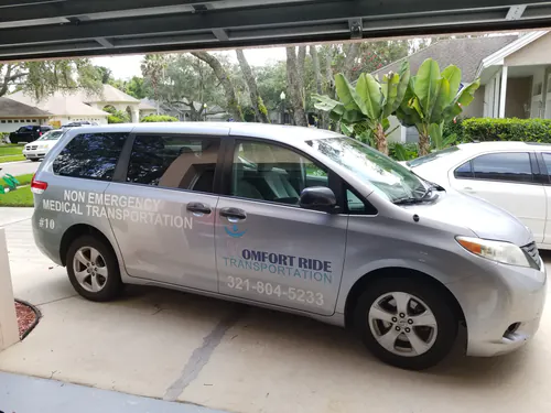 Comfort Ride Transportation Toyota Sienna van number 10 parked in a Leesburg driveway for a residential pickup